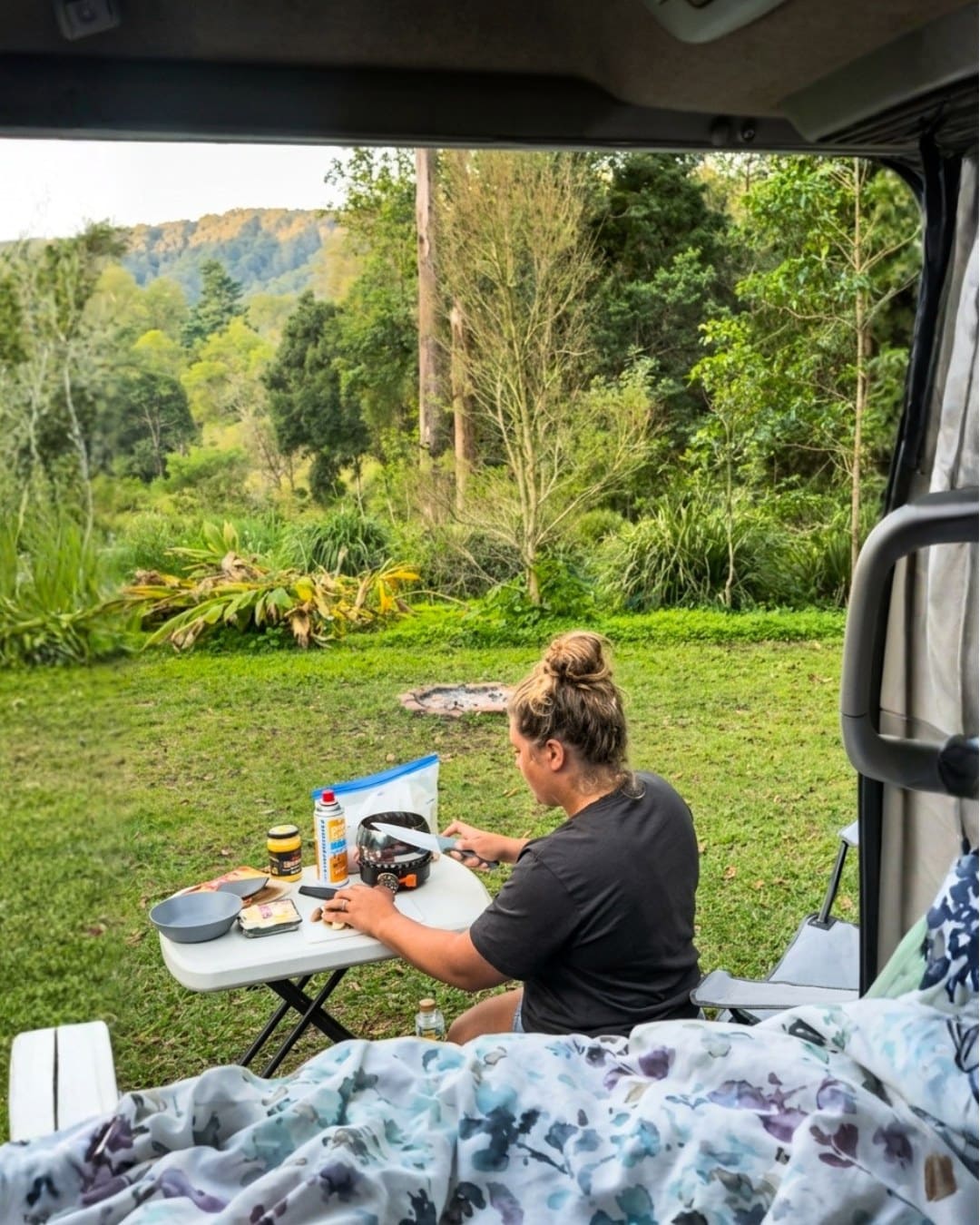 Camping set up beside the Mystery Machine