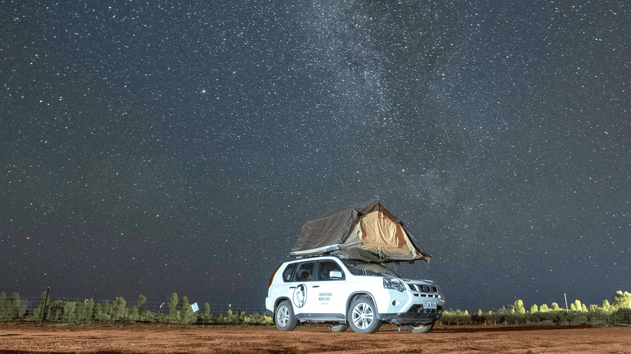 Wicked Camper 4WD under the stars in Northern Territory.